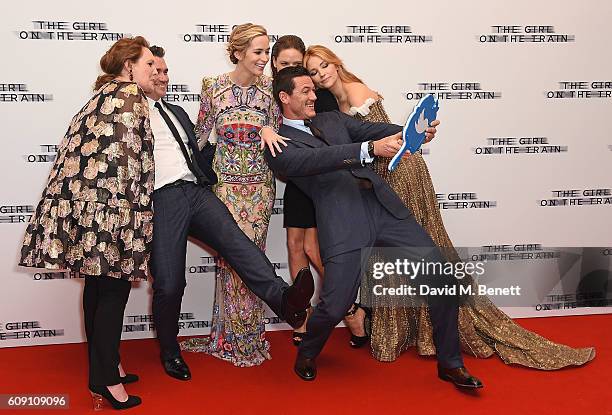 Paula Hawkins, Tate Taylor, Emily Blunt, Rebecca Ferguson, Luke Evans and Haley Bennett attend the World Premiere of "The Girl On The Train at Odeon...