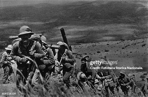 The march of the Italian army in Ethiopia during the war in East Africa. From the propaganda photographic series documenting companies of the Italian...