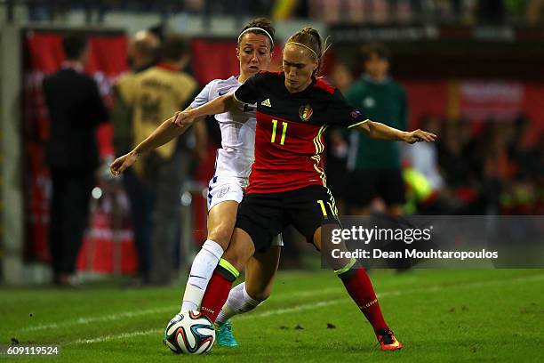 Lucia Bronze of England battles for the ball with Janice Cayman of the Belgium during the UEFA Women's Euro 2017 Qualifier between Belgium and...