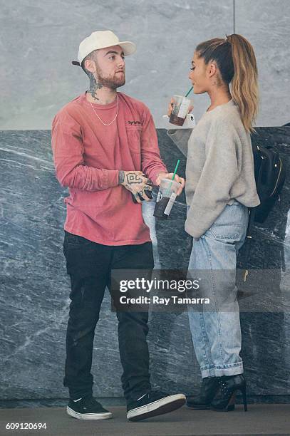 Rapper Mac Miller and singer Ariana Grande enter the Sirius XM Studios on September 20, 2016 in New York City.