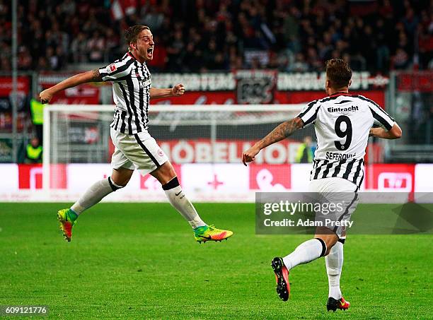 Bastian Oczipka of Eintracht Frankfurt celebrates scoring the second goal during the Bundesliga match between FC Ingolstadt 04 and Eintracht...