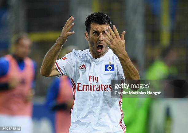 Emir Spahic of Hamburg reacts during the Bundesliga match between SC Freiburg and Hamburger SV at Schwarzwald-Stadion on September 20, 2016 in...