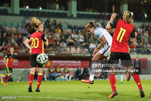 Nikita Parris of England scores the first goal during the UEFA Women's Euro 2017 qualification match between Belgium and England at Stadion OHL on...