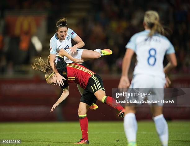 Jade Moore of England and Janice Cayman of Belgium in action during the UEFA Women's Euro 2017 qualification match between Belgium and England at...