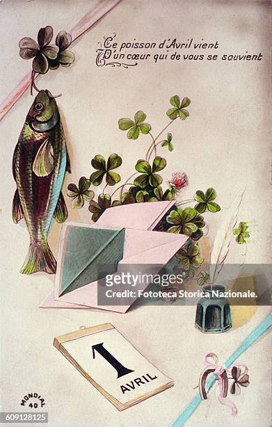 The first April, composition with elements brings luck, the April fish, four-leafed clover and a small horseshoe. A message reads: "Ce poisson...