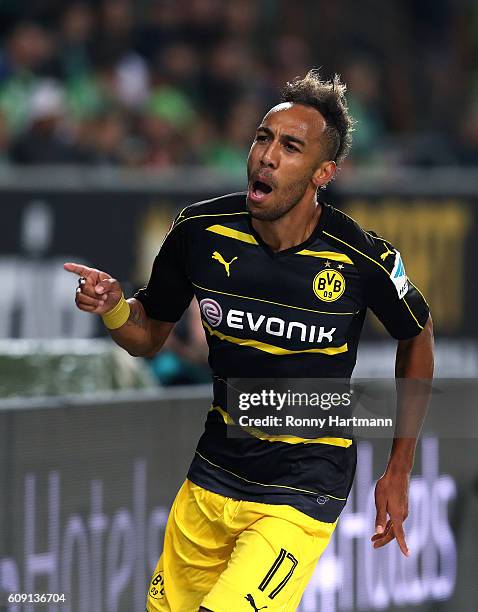 Pierre-Emerick Aubameyang of Dortmund celebrates after scoring his team's second goal during the Bundesliga match between VfL Wolfsburg and Borussia...