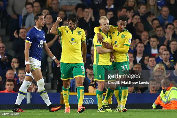 Steven Naismith of Norwich City celebrates scoring the opening goal with Josh Murphy during the EFL Cup Third Round match between Everton and Norwich...