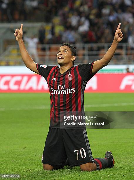 Carlos Bacca of AC Milan celebrates after scoring the opening goal during the Serie A match between AC Milan and SS Lazio at Stadio Giuseppe Meazza...