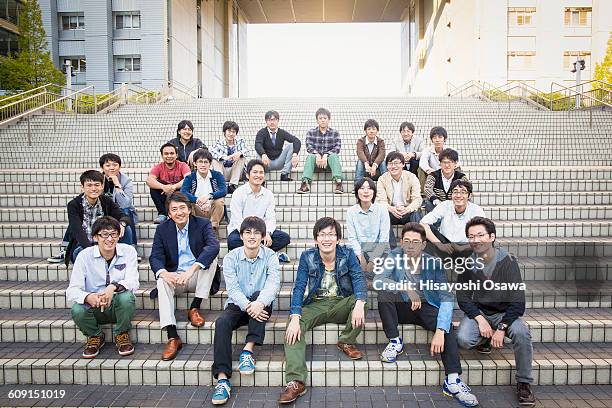 professor with students on steps - 大学生　日本 ストックフォトと画像