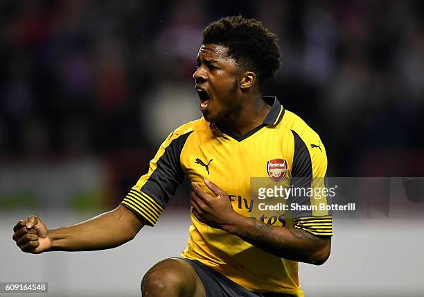 Chuba Akpom of Arsenal celebrates after winning a penalty which lead to his sides second goal during the EFL Cup Third Round match between Nottingham...