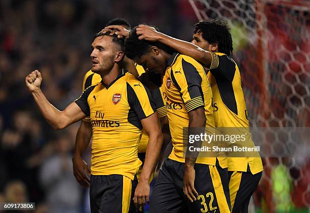 Lucas Perez of Arsenal celebrates scoring his team's third goal during the EFL Cup Third Round match between Nottingham Forest and Arsenal at City...
