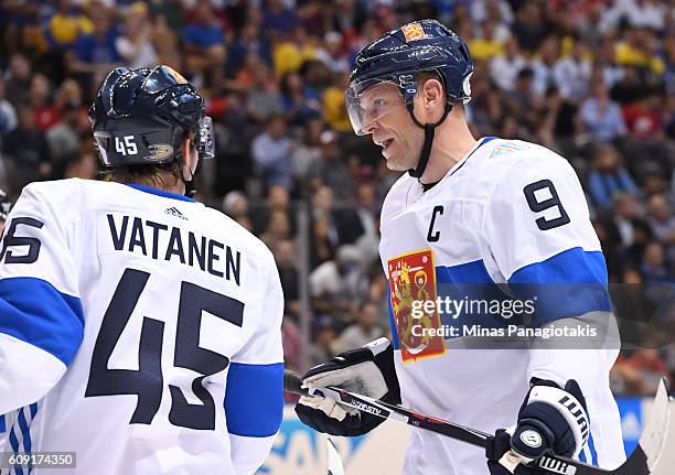 Sami Vatanen talks with Mikko Koivu of Team Finland between whistles during the World Cup of Hockey 2016 at Air Canada Centre on September 20, 2016...