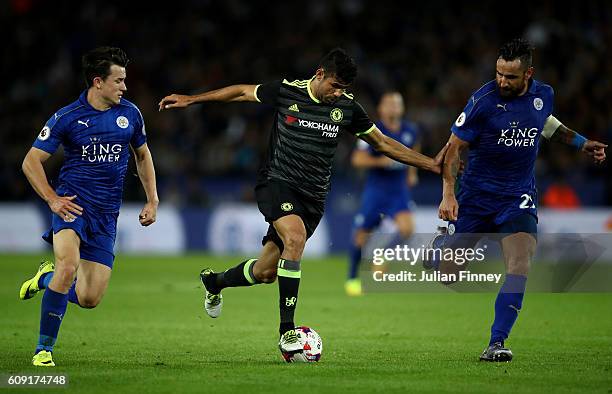 Diego Costa of Chelsea runs at goal as he is chased down by Ben Chilwell of Leicester City and Marcin Wasilewski of Leicester City during the EFL Cup...