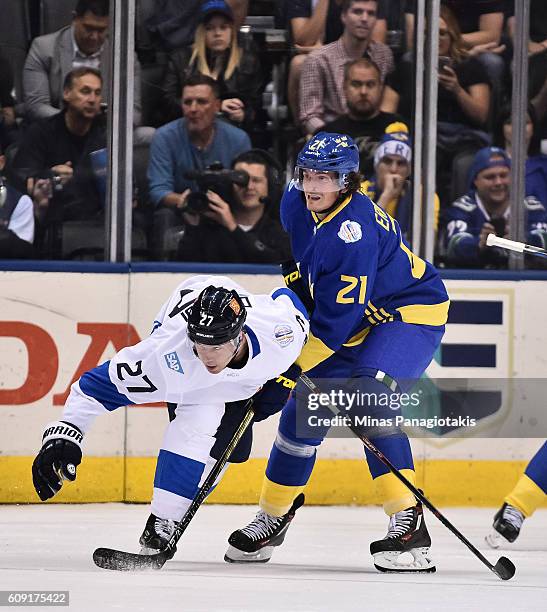 Loui Eriksson of Team Sweden collides with Joonas Donskoi of Team Finland during the World Cup of Hockey 2016 at Air Canada Centre on September 20,...