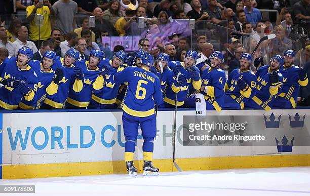 Anton Stralman of Team Sweden high fives the bench after scoring a second period goal on Team Finland during the World Cup of Hockey 2016 at Air...