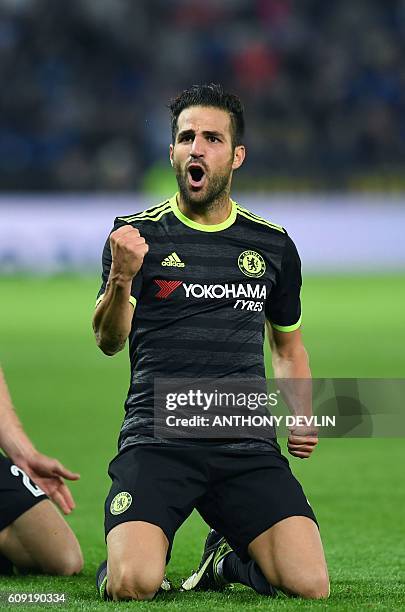 Chelsea's Spanish midfielder Cesc Fabregas celebrates scoring their fourth goal during extra-time in the English League Cup third round football...