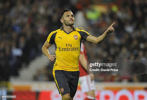 Lucas Perez celebrates scoring Arsenal's 2nd goal during the match between Nottingham Forest and Arsenal at City Ground on September 20, 2016 in...