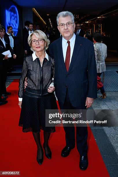 Daniel Guerlain and his wife Florence Guerlain attend the "Cezanne et Moi" movie Premiere to Benefit 'Claude Pompidou Foundation'. Held at UGC...