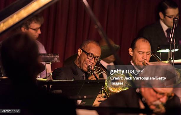 American Jazz musician Douglas Purviance, plays bass trombone, as he performs with the Vanguard Jazz Orchestra at the Village Vanguard, New York, New...