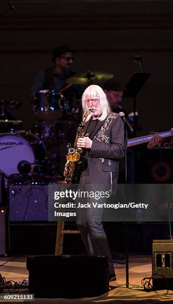 American Blues and Rock musician Edgar Winter plays saxophone as he performs onstage during Lead Belly Fest at Carnegie Hall, New York, New York,...