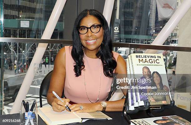 Cookie Johnson signs copies of her new book "Believing in Magic: My Story of Love, Overcoming Adversity, and Keeping the Faith" at NBA Store on...