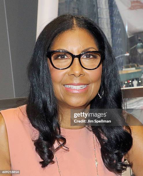 Cookie Johnson signs copies of her new book "Believing in Magic: My Story of Love, Overcoming Adversity and Keeping the Faith" at NBA Store on...