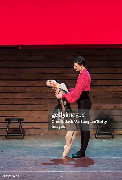 Russian dancers Diana Vishneva and Ivan Oskorbin , both of the Mariinsky Ballet, perform 'Carmen Suite' during 'A Tribute to Maya Plisetskaya' at the...