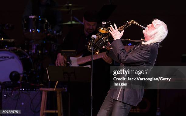 American Blues and Rock musician Edgar Winter plays saxophone as he performs onstage during Lead Belly Fest at Carnegie Hall, New York, New York,...