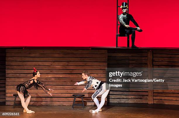 From left, Russian dancers Diana Vishneva , Alexander Sergeev , and Roman Belyakov , all of the Mariinsky Ballet, perform 'Carmen Suite' during 'A...