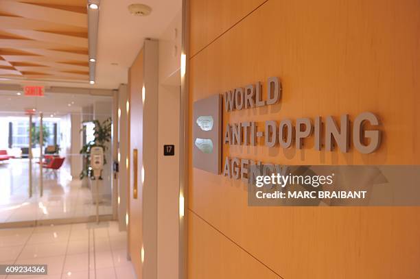 Picture of the logo of World Anti-Doping Agency taken on September 20, 2016 at the headquarter of the organisation in Montreal. / AFP / Marc BRAIBANT