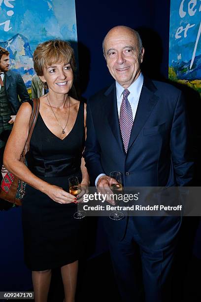 Politician Alain Juppe and his wife Isabelle attend the "Cezanne et Moi" movie Premiere to Benefit 'Claude Pompidou Foundation'. Held at UGC...