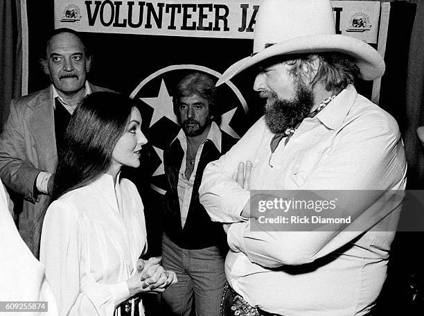 Nashville Charlie Daniels chats backstage with Crystal Gayle during Charlie Daniels Volunteer Jam VIII in Nashville, Tennessee on January 30, 1982