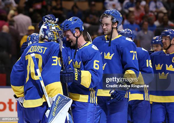 Anton Stralman congratulates Henrik Lundqvist of Team Sweden after a 2-0 shutout win over Team Finland during the World Cup of Hockey 2016 at Air...