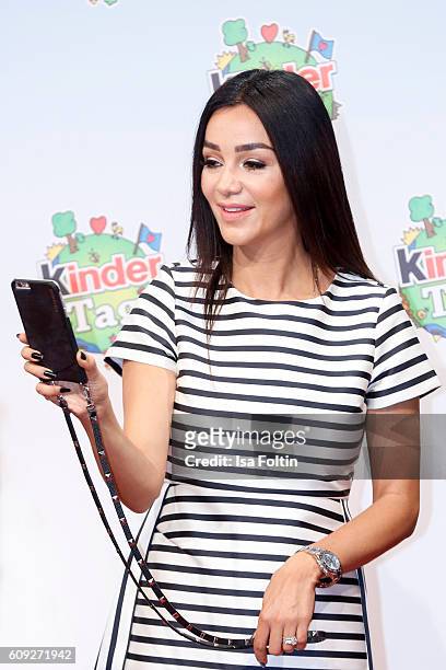 Verona Pooth makes a selfie during the KinderTag to celebrate children's day on September 20, 2016 in Noervenich near Dueren, Germany.