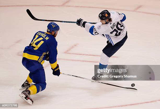 Mattias Ekholm of Team Sweden blocks the shot of Sebastian Aho of Team Finland in the third period during the World Cup of Hockey at the Air Canada...