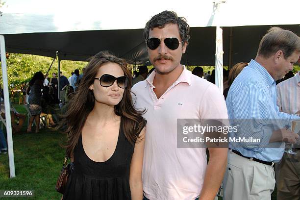 Kristina Ratliff and Douglas Friedman attend ACRIA and BANANA REPUBLIC Host COCKTAILS AT SUNSET at The Home of Ross Bleckner on July 7, 2007 in...