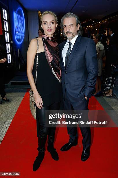 Inna Zobova and her husband Bruno Aveillan attend the "Cezanne et Moi" movie Premiere to Benefit 'Claude Pompidou Foundation'. Held at UGC Normandie...