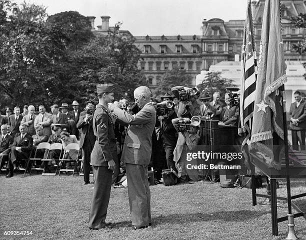 Among the fifteen servicemen awarded the Congressional Medal of Honor at a mass presentation in the White House gardens was Corporal Desmond T. Doss,...