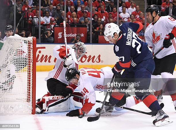 Ryan McDonagh of Team USA jumps on a loose puck to score a first period goal on Carey Price of Team Canada during the World Cup of Hockey 2016 at Air...