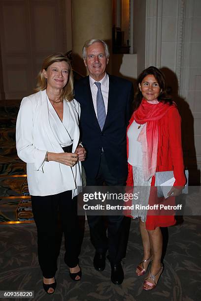 Michel Barnier standing between his wife Isabelle and Miss Denis de Kergorlay attend the Charity Dinner to Benefit 'Claude Pompidou Foundation'...