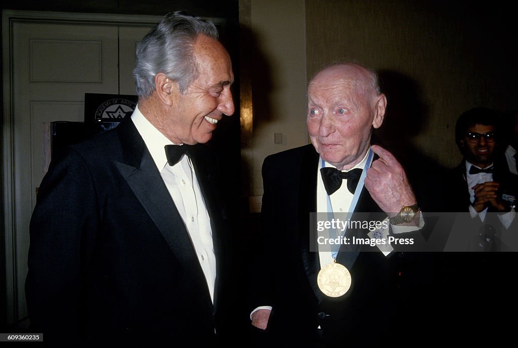 Simon Peres and Nobel Prize winning author Isaac Bashevis Singer...
