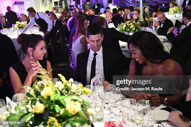 Flavia Pennetta, Novak Djokovic and Serena Williams attend the Milano Gala Dinner benefitting the Novak Djokovic Foundation presented by Giorgio...