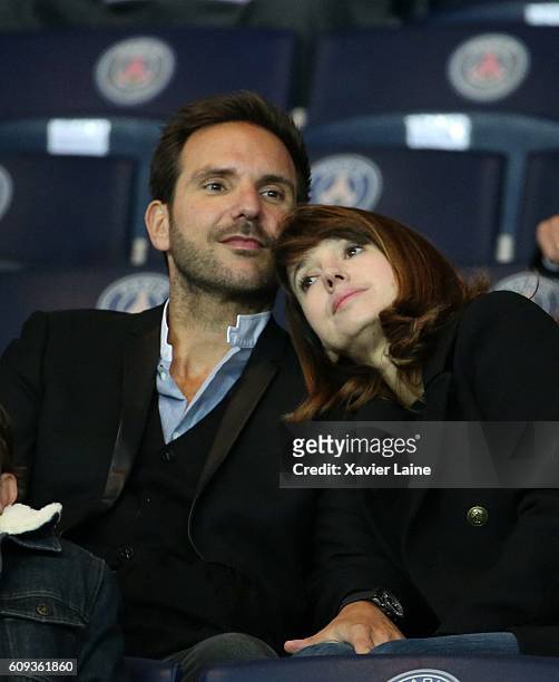 Christophe Michalak and his wife Delphine McCarty attends the French Ligue 1 match between Paris Saint-Germain and Dijon FCO at Parc des Princes on...