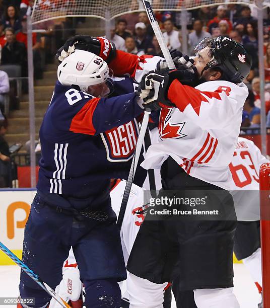 Justin Abdelkader of Team USA and Drew Doughty of Team Canada battle during the first period during the World Cup of Hockey tournament at the Air...