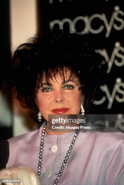 Elizabeth Taylor at a perfume launch at Macy's circa 1996 in New York City.