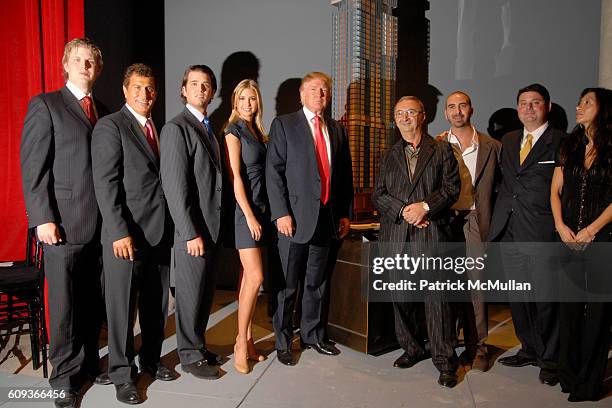 Eric Trump, Tevfik Arif, Donald Trump Jr., Ivanka Trump, Donald Trump, Tamir Sapir, Alex Sapir, Julius Schwarz and Zina Sapir attend TRUMP SOHO Press...