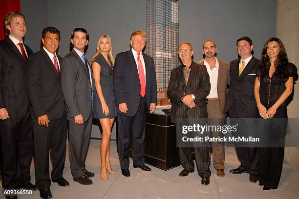 Eric Trump, Tevfik Arif, Donald Trump Jr., Ivanka Trump, Donald Trump, Tamir Sapir, Alex Sapir, Julius Schwarz and Zina Sapir attend TRUMP SOHO Press...