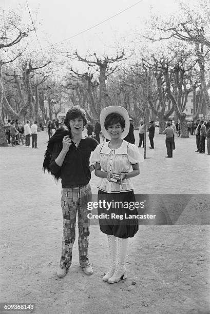 English singer Mick Jagger of The Rolling Stones with his girlfriend Bianca Pérez-Mora Macias in St Tropez, France, April 1971.