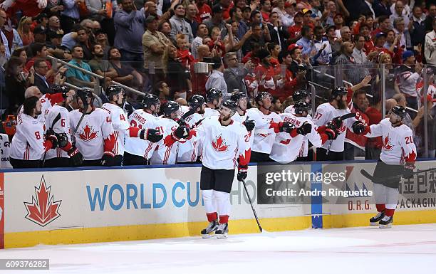 Alex Pietrangelo and John Tavares of Team Canada high fives the bench after a second period goal against Team USA during the World Cup of Hockey 2016...