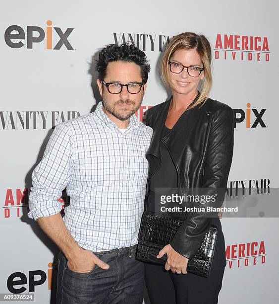 Director and host committee member J.J. Abrams and host committee member Katie McGrath attend EPIX "America Divided" LA Premiere at Billy Wilder...